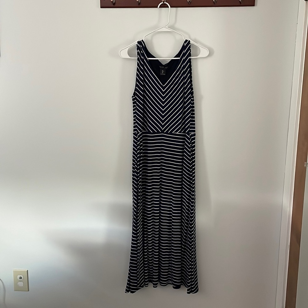 Navy and white stripes, mid length dress. Stretchy, comfortable fabric.